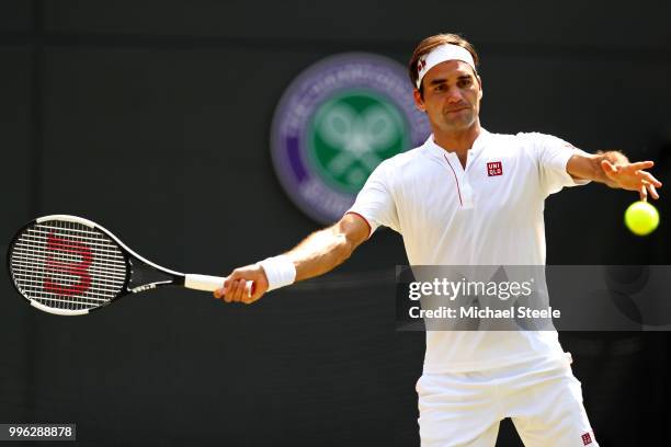 Roger Federer of Switzerland plays a forehand against Kevin Anderson of South Africa during their Men's Singles Quarter-Finals match on day nine of...