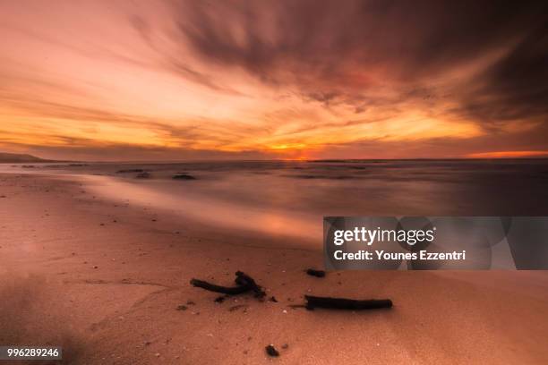 dramatic sunset - younes stock pictures, royalty-free photos & images