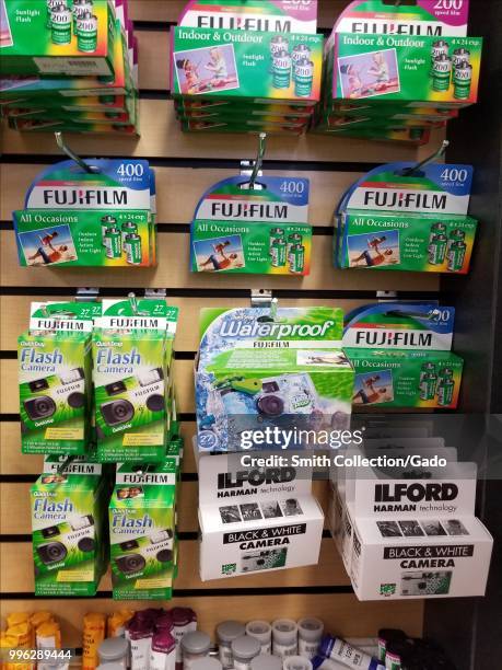 Disposable analog film cameras, including black and white film cameras from film manufacturer Ilford, are on display at Mike's Camera in Dublin,...