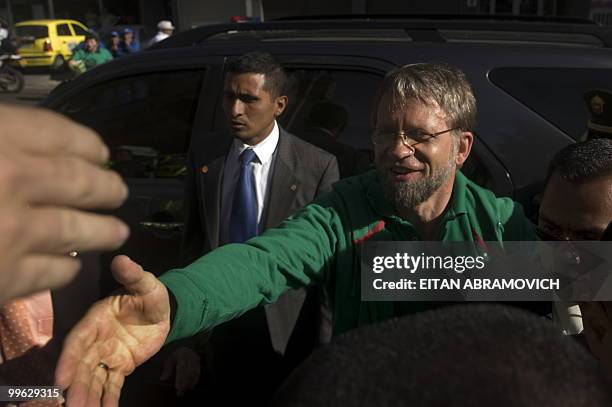 Colombian presidential candidate for the Green Party, Antanas Mockus, greets supporters as he arrives to a rally in Bogota on May 16, 2010. Colombia...