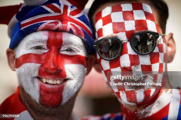 An England and a Croatian football fan pose in Red Square ahead of tonight's World Cup semi-final game between England and Croatia on July 11, 2018...