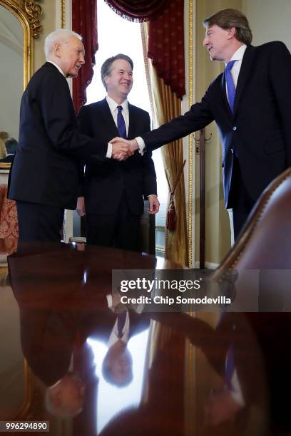 Senate Finance Committee Chairman Orrin Hatch shakes hands with White House Counsel Don McGahn before meeting with him and Judge Brett Kavanaugh in...