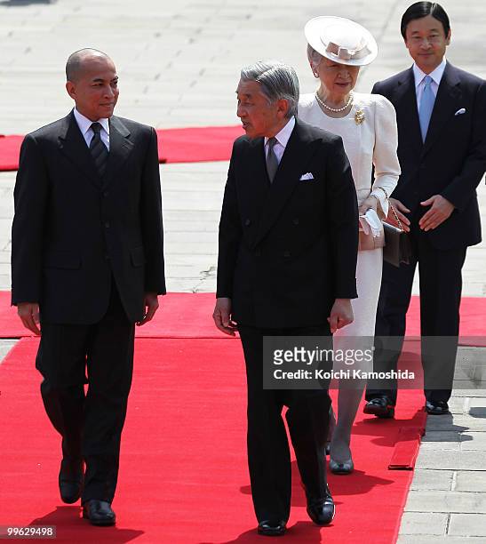 King Norodom Sihamoni of Cambodia is escorted by Emperor Akihito , Empress Michiko and Crown Prince Naruhito during his welcoming ceremony at the...
