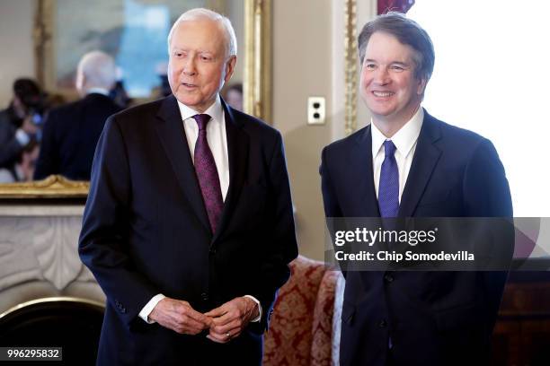 Senate Finance Committee Chairman Orrin Hatch and Judge Brett Kavanaugh pose for photographs in the Senate President pro tempore office before a...