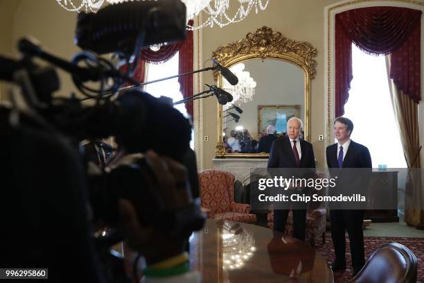 Senate Finance Committee Chairman Orrin Hatch and Judge Brett Kavanaugh pose for photographs in the Senate President pro tempore office before a...