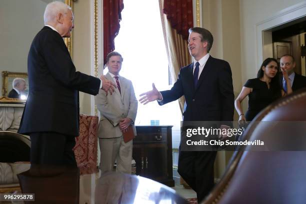 Senate Finance Committee Chairman Orrin Hatch welcomes Judge Brett Kavanaugh to the Senate President pro tempore office before a meeting at the U.S....