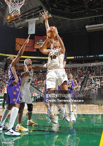 Tanisha Wright of the Seattle Storm goes to the basket against Noelle Quinn of the Los Angeles Sparks on May 16, 2010 at Key Arena in Seattle,...