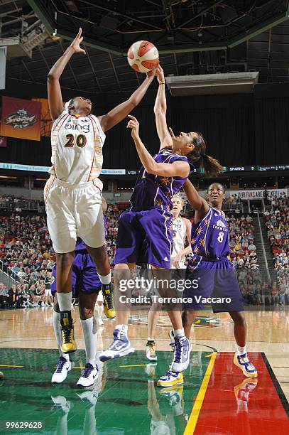 Camille Little of the Seattle Storm grabs a rebound against Ticha Penicheiro of the Los Angeles Sparks on May 16, 2010 at Key Arena in Seattle,...