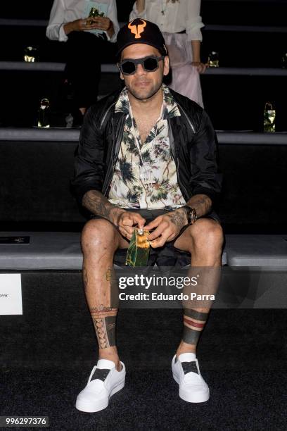 Soccer player Dani Alves attends Marcos Luengo show at Mercedes Benz Fashion Week Madrid Spring/ Summer 2019 at IFEMA on July 11, 2018 in Madrid,...