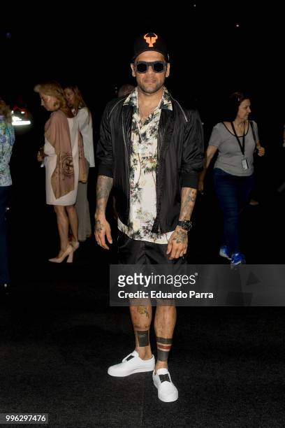 Soccer player Dani Alves attends Marcos Luengo show at Mercedes Benz Fashion Week Madrid Spring/ Summer 2019 at IFEMA on July 11, 2018 in Madrid,...