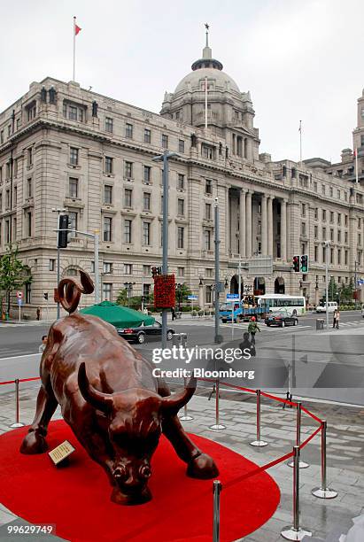 Arturo Di Modica's Charging Bull statue, a version of which is also installed near New York City's Wall Street financial district, is seen in front...