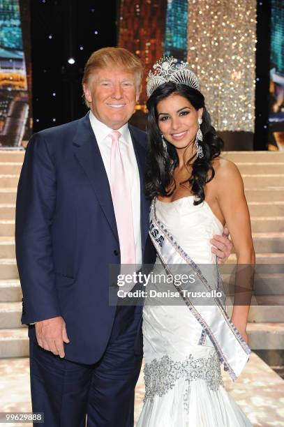 Donald J. Trump poses with Rima Fakih, winner of the Miss USA 2010 pageant, at Planet Hollywood Casino Resort on May 16, 2010 in Las Vegas, Nevada.