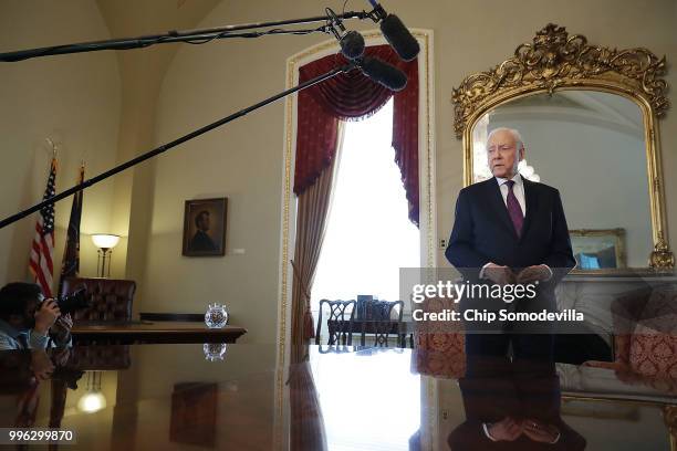 Senate Finance Committee Chairman Orrin Hatch talks with reporters in the Senate President pro tempore office while waiting for the arrival of Judge...