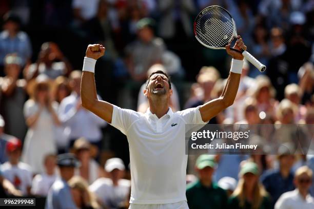 Novak Djokovic of Serbia celebrates winning match point against Kei Nishikori of Japan during their Men's Singles Quarter-Finals match on day nine of...