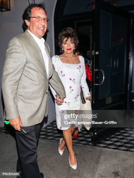 Joan Collins and Percy Gibson are seen on July 10, 2018 in Los Angeles, California.