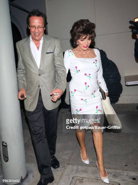 Joan Collins and Percy Gibson are seen on July 10, 2018 in Los Angeles, California.