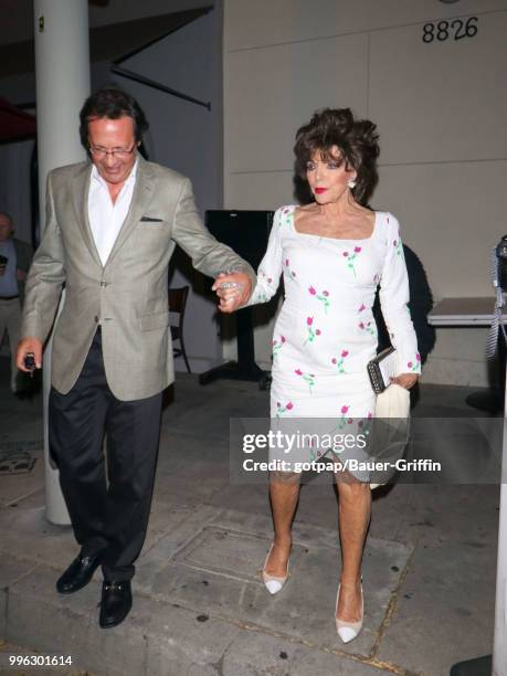 Joan Collins and Percy Gibson are seen on July 10, 2018 in Los Angeles, California.