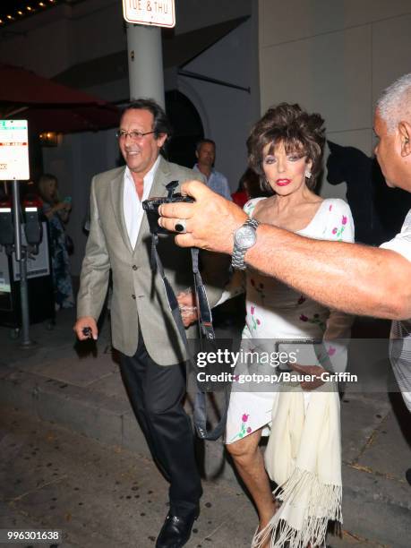 Joan Collins and Percy Gibson are seen on July 10, 2018 in Los Angeles, California.