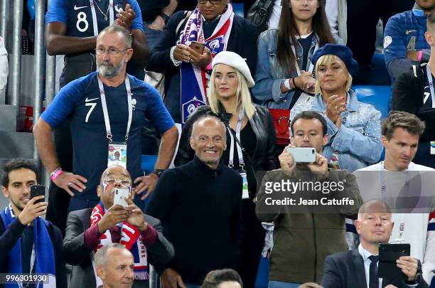 Erika Choperena, wife of Antoine Griezmann of France between his parents Alain Griezmann and Isabelle Griezmann during the 2018 FIFA World Cup Russia...