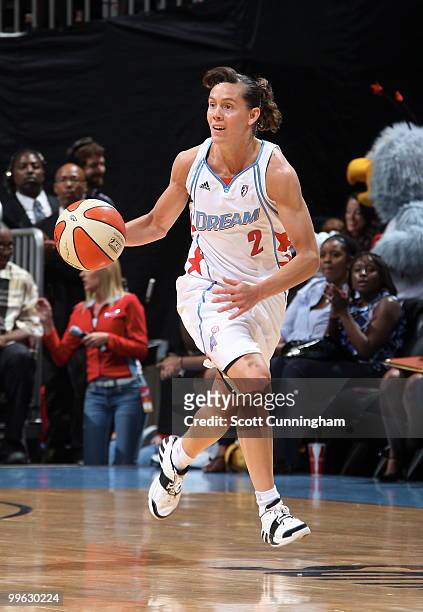 Kelly Miller of the Atlanta Dream drives against the Indiana Fever at Philips Arena on May 16, 2010 in Atlanta, Georgia. NOTE TO USER: User expressly...