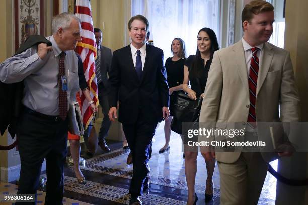 Judge Brett Kavanaugh , former Senator Jon Kyl and others leave a meeting with Senate Finance Committee Chairman Orrin Hatch at the U.S. Capitol July...