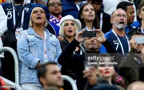Erika Choperena, wife of Antoine Griezmann of France between his parents Alain Griezmann and Isabelle Griezmann during the 2018 FIFA World Cup Russia...