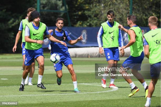 David Luiz and Cesc Fabregas of Chelsea during a training session at Chelsea Training Ground on July 11, 2018 in Cobham, England.