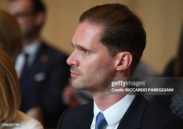 Husband of Luxembourg's Prime Minister Gauthier Destenay looks on during a musical performance during a visit to the The Queen Elisabeth Music Chapel...