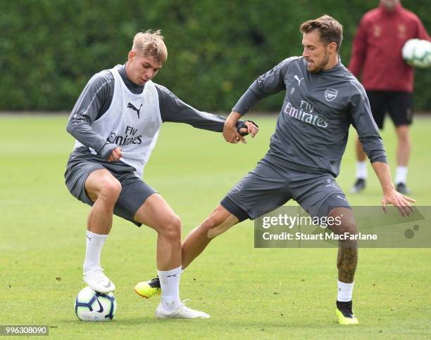 Emile Smith Rown and Aaron Ramsey of Arsenal during a training session at London Colney on July 11, 2018 in St Albans, England.