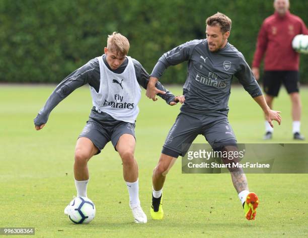 Emile Smith Rown and Aaron Ramsey of Arsenal during a training session at London Colney on July 11, 2018 in St Albans, England.