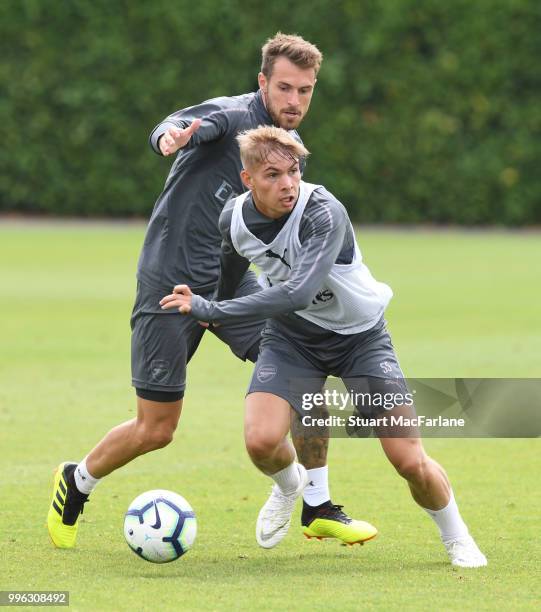 Emile Smith Rown and Aaron Ramsey of Arsenal during a training session at London Colney on July 11, 2018 in St Albans, England.