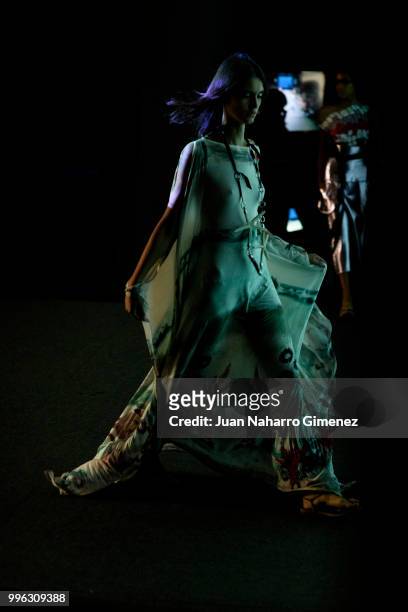 Model is seen backstage during the Marcos Luengo fashion show during the Mercedes-Benz Fashion Week Madrid Spring/Summer 2019 at IFEMA on July 11,...