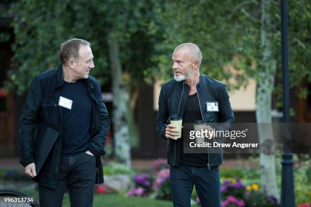 Francois-Henri Pinault, chief executive officer of Kering, and venture capitalist Aviv 'Vivi' Nevo arrive for a morning session of the annual Allen &...