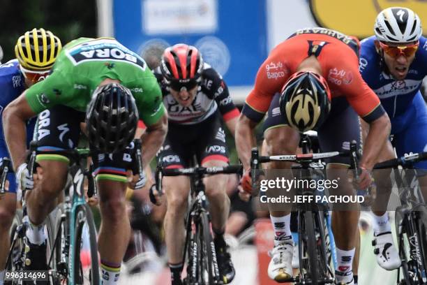 Slovakia's Peter Sagan sprints in the last meters to win ahead of Italy's Sonny Colbrelli and Belgium's Philippe Gilbert the fifth stage of the 105th...