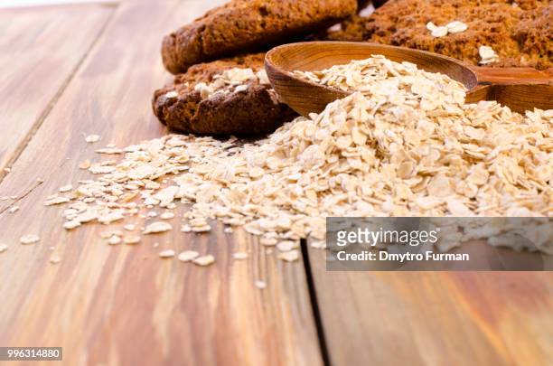 oatmeal cookies crumbs in a wooden platter. - macrobiotic diet stock pictures, royalty-free photos & images