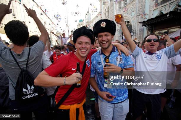 England fans sing songs and soak up the party atmosphere in Nikolskaya St near Red Square ahead of tonight's World Cup semi-final game between...