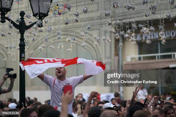 England fans sing songs and soak up the party atmosphere in Nikolskaya St near Red Square ahead of tonight's World Cup semi-final game between...