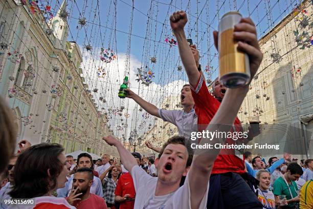 England fans sing songs and soak up the party atmosphere in Nikolskaya St near Red Square ahead of tonight's World Cup semi-final game between...