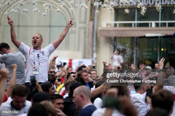 England fans sing songs and soak up the party atmosphere in Nikolskaya St near Red Square ahead of tonight's World Cup semi-final game between...