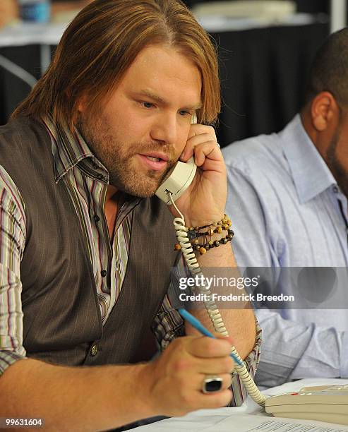 Country Singer James Otto works the phone bank during the "Music City Keep on Playin'" benefit concert at the Nashville Convention center on May 16,...