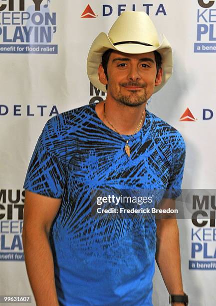 Country singer Brad Paisley poses after working the phone bank during the "Music City Keep on Playin'" benefit concert at the Nashville Convention...