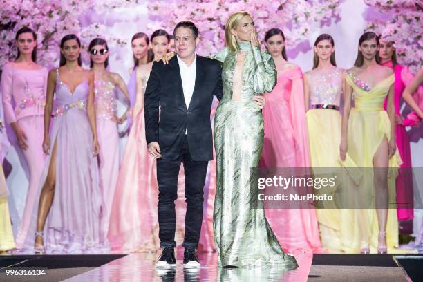 Model Judith Masco and designer Hannibal Laguna walks the runway at the 'Hannibal Laguna' catwalk during the Mercedes-Benz Madrid Fashion Week...