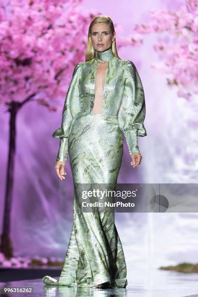 Model Judith Masco walks the runway at the 'Hannibal Laguna' catwalk during the Mercedes-Benz Madrid Fashion Week Spring/Summer in Madrid, Spain....