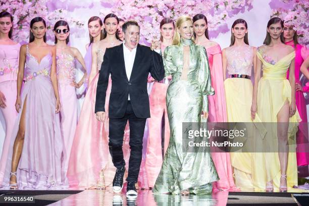 Model Judith Masco and designer Hannibal Laguna walks the runway at the 'Hannibal Laguna' catwalk during the Mercedes-Benz Madrid Fashion Week...