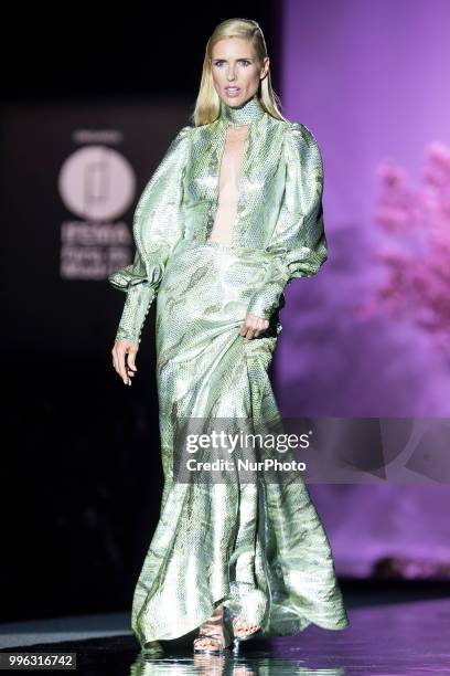 Model Judith Masco walks the runway at the 'Hannibal Laguna' catwalk during the Mercedes-Benz Madrid Fashion Week Spring/Summer in Madrid, Spain....