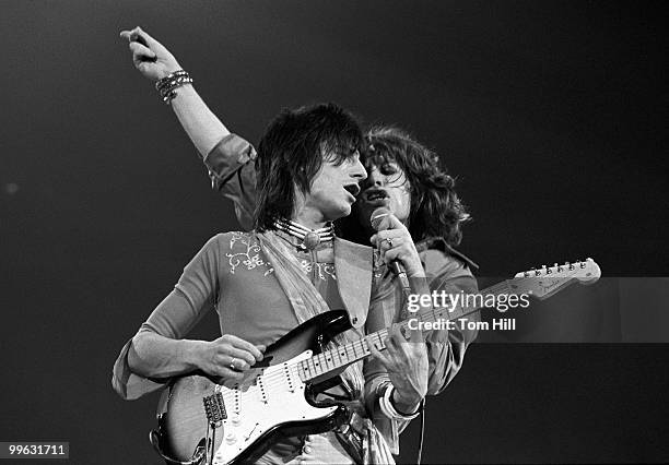 Guitarist Ronnie Wood and singer-frontman Mick Jagger perform with The Rolling Stones at the Omni Coliseum on July 30, 1975 in Atlanta, Georgia.