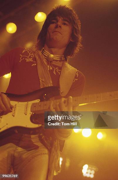 Guitarist Ronnie Wood performs with The Rolling Stones at the Omni Coliseum on July 30, 1975 in Atlanta, Georgia.