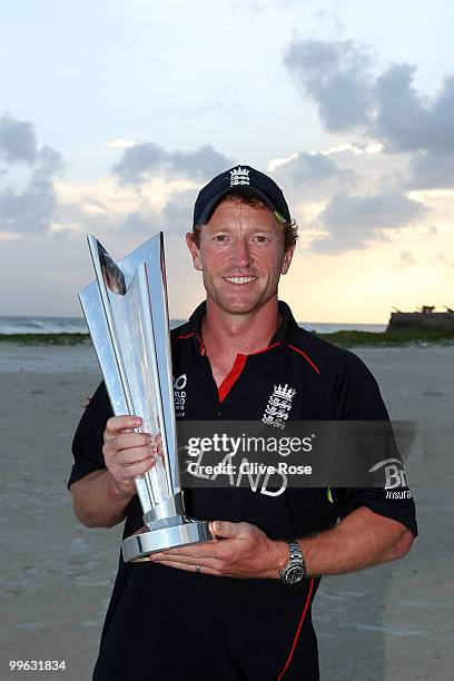 Paul Collingwood of England poses with the ICC World Twenty20 trophy on the beach after the final of the ICC World Twenty20 between Australia and...