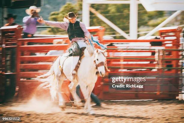 competition rodeo saddle bronc - rodeo clown stock pictures, royalty-free photos & images