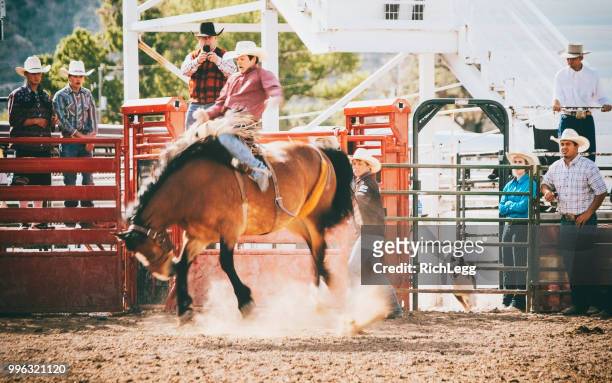 competition rodeo saddle bronc - rodeo clown stock pictures, royalty-free photos & images